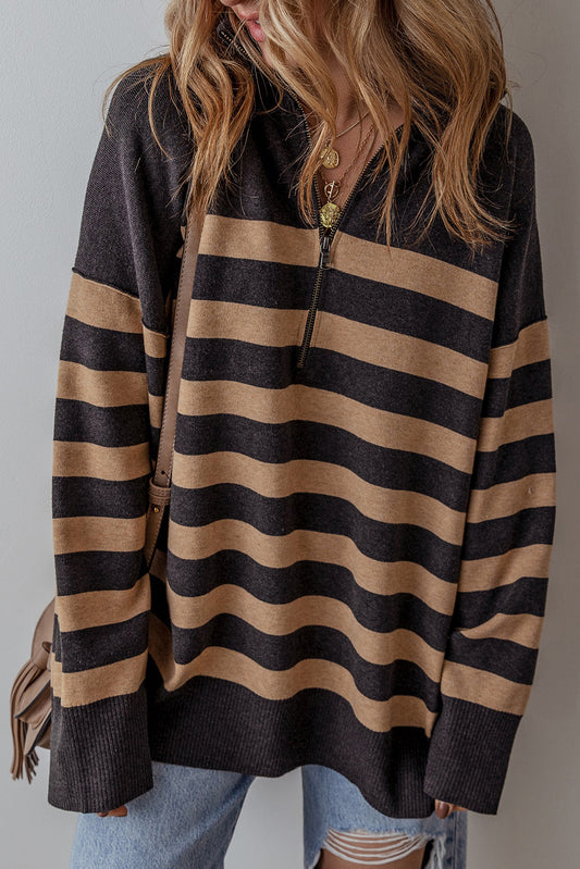 Black and camel striped quarter-zip sweater with jeans, front view