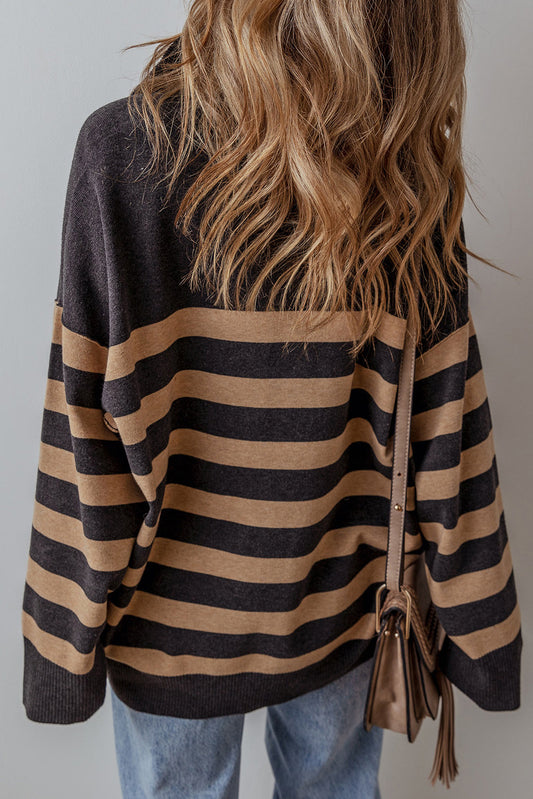 Back view of the black and camel striped sweater