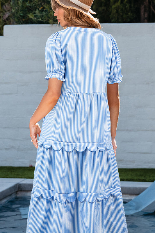 Back view of the light blue striped scallop midi dress