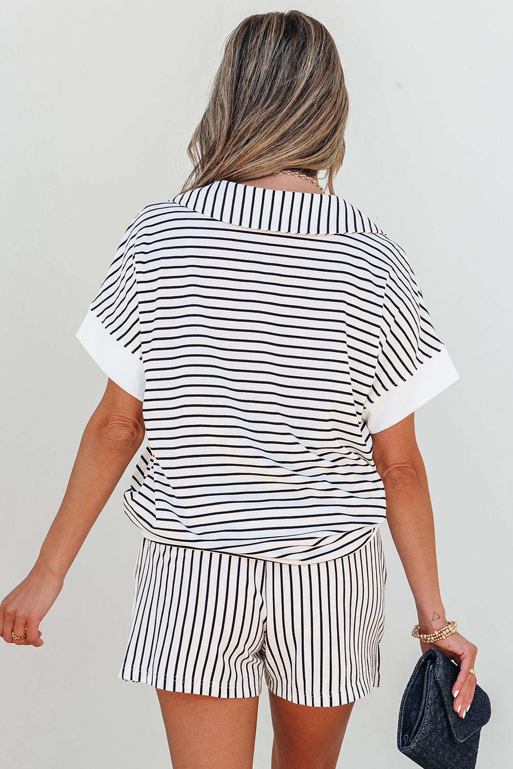 Back view of the black and white striped shorts set