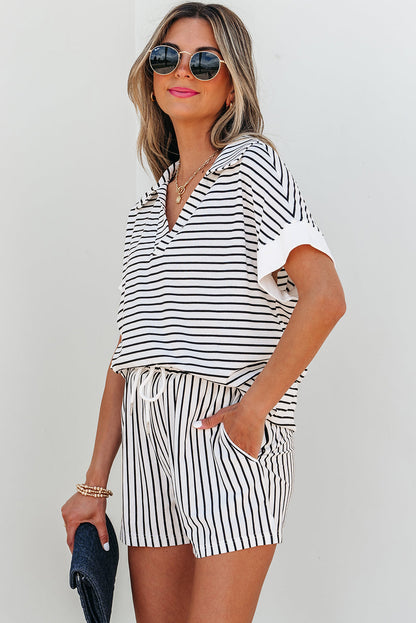 Three-quarter view of the striped set, hand in the shorts pocket