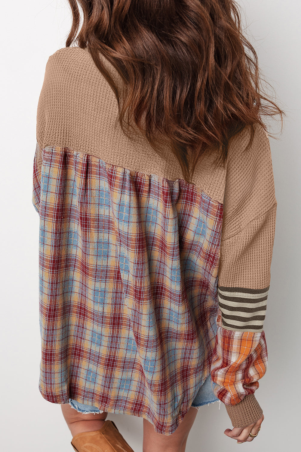 Back of the tan henley top with a plaid patchwork panel