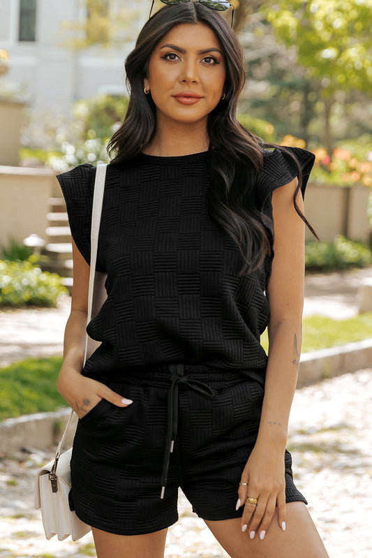 Black waffle knit ruffle sleeve tee and drawstring shorts, front view