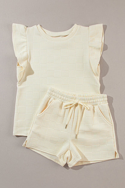 Cream waffle knit ruffle sleeve tee and shorts laid flat