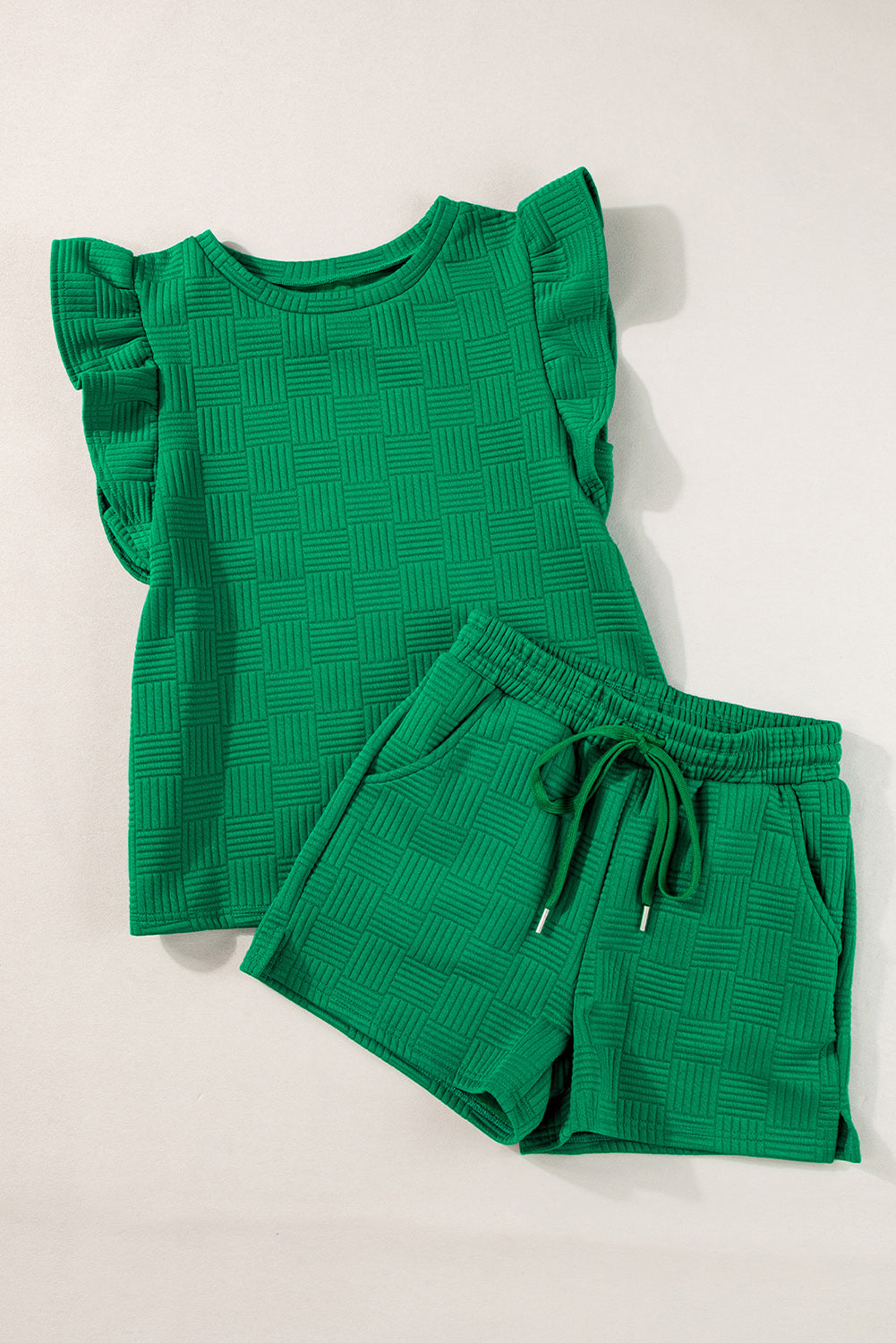 Green waffle knit ruffle sleeve tee and shorts laid flat